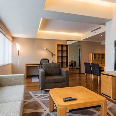 เซี่ยงไฮ้ เซ็นเตอร์ เซอร์วิซ อพาร์ตเมนต์ Aparthotel ภายนอก รูปภาพ