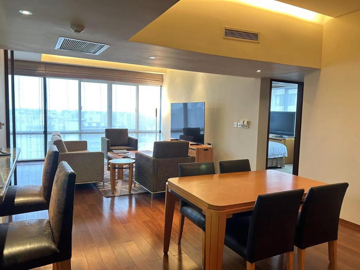 เซี่ยงไฮ้ เซ็นเตอร์ เซอร์วิซ อพาร์ตเมนต์ Aparthotel ภายนอก รูปภาพ