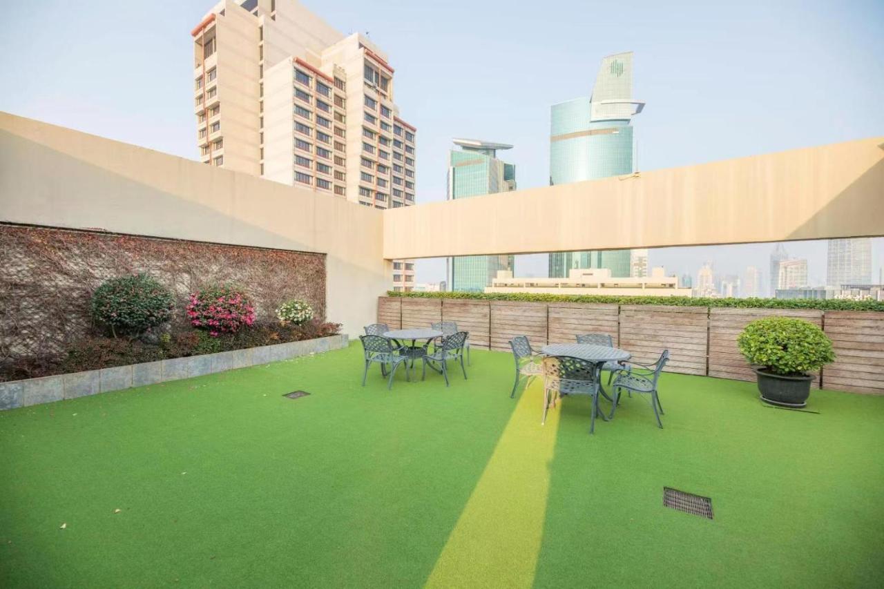 เซี่ยงไฮ้ เซ็นเตอร์ เซอร์วิซ อพาร์ตเมนต์ Aparthotel ภายนอก รูปภาพ