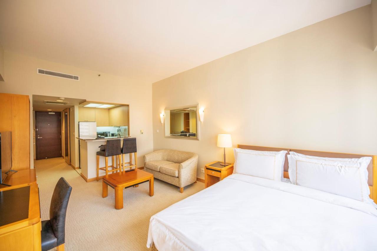 เซี่ยงไฮ้ เซ็นเตอร์ เซอร์วิซ อพาร์ตเมนต์ Aparthotel ภายนอก รูปภาพ